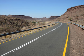Fototapeta na wymiar Paved, remote road, Namib, Namibia