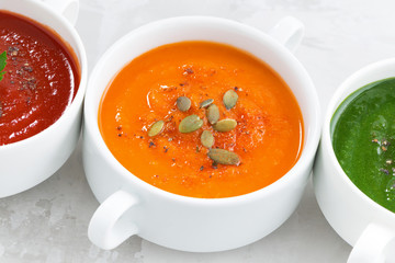 assortment of colorful vegetable cream soup, closeup