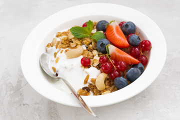 Baked muesli with fresh berries and yogurt