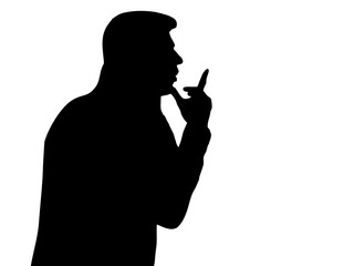 silhouette of a pensive man