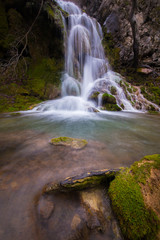 Obraz premium Beautiful waterfalls and mountain stream in Transylvania, in early spring