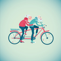 Elderly couple riding a bicycle