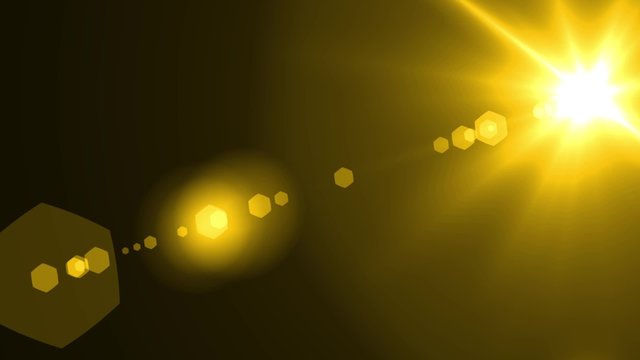下から上へ移動するレンズフレア　黄色