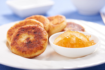 Cheese pancake on a plate with lemon jam