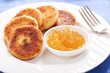 Cheese pancake on a plate with lemon jam
