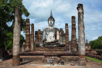 The Buddha image respectfully engaged placed at a temple called Wat Mahathat, was built about 700 years ago. The temple is part of the Sukhothai Historical Park, which is now a World Heritage site.