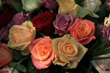 Pastel roses in bridal arrangement