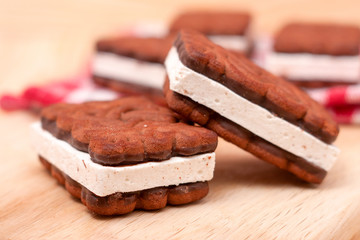 coockies with zephyr layer on wooden background