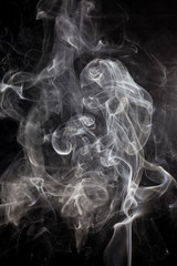 White smoke on a black background.