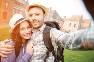 Young couple on holidays taking selfie