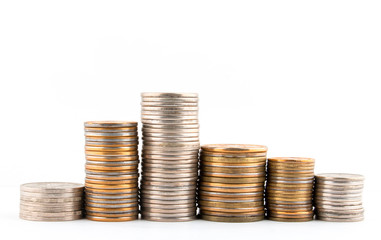 Columns of coins on white background