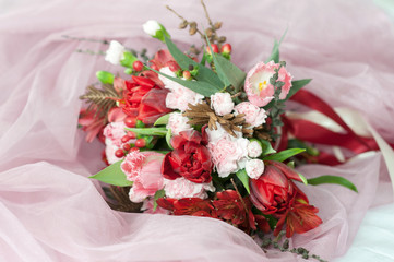 beautiful spring bouquet of carnations and tulips