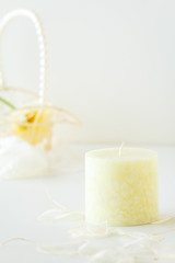 Obraz na płótnie Canvas Palm yellow candle with white background