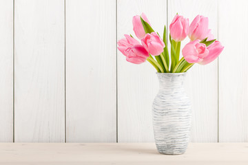 Fresh pink tulips in a  jug