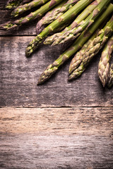 Fresh asparagus on wooden table , diet concept