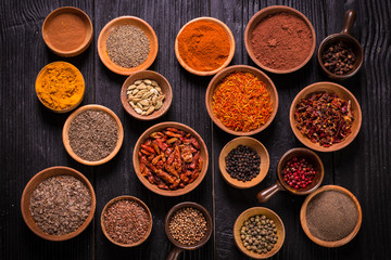 spices and herbs on wooden table , medicinal concept