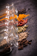 spices and herbs on wooden table , medicinal concept