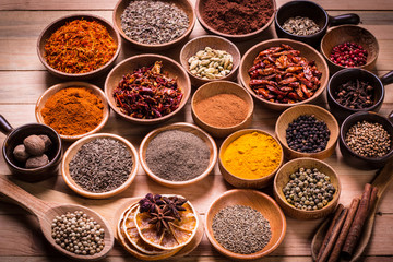 spices and herbs on wooden table , medicinal concept