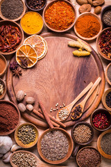 spices and herbs on wooden table.