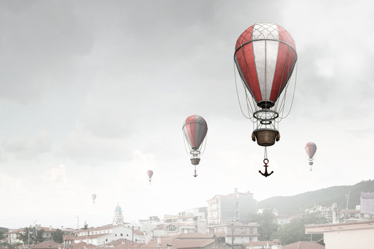 Aerostats flying over city