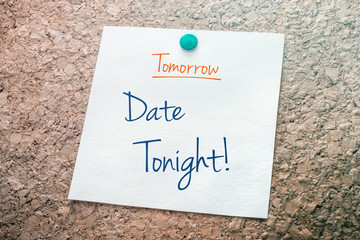 Date Tonight Reminder For Tomorrow On Paper Pinned On Cork Board