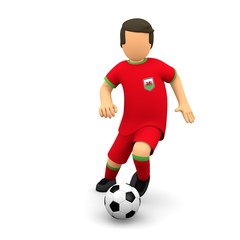 Walisische Fußballer läuft mit dem Ball