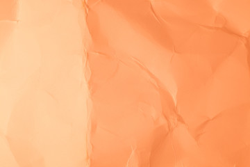 Texture creased orange paper background.