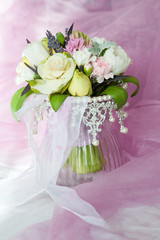 close-up of wedding bouquet whith crown