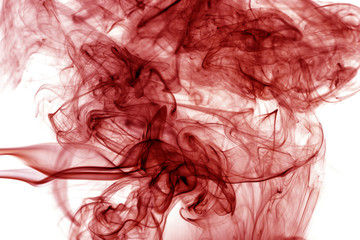 Red smoke on a white background.