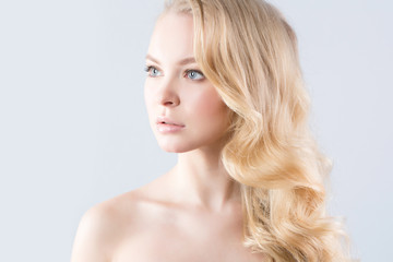 Fototapeta premium Portrait of beautiful blonde. Health and Beauty.