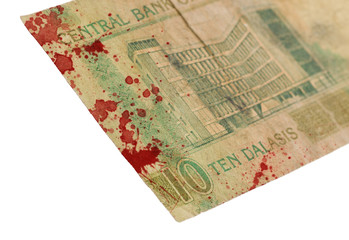 5 Gambian dalasi bank note, bloody