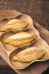Kibinai (kybyn,kybynlar,chiburekki,shishlik) are traditional pastries filled with mutton and onion, popular with Karaite ethnic minority in Lithuania. Kibinai usually served with chicken broth.