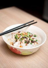 Rice noodle soup with slice pork roll.