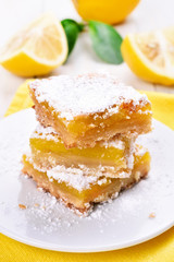 Lemon pie sliced on white plate