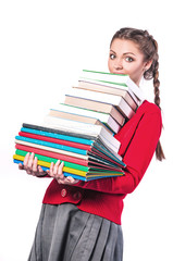 girl standing with a bunch of books