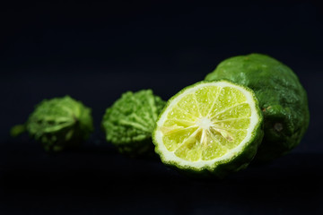 Bergamot / Ripe bergamot on black background.