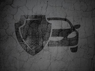 Insurance concept: Car And Shield on grunge wall background