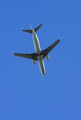 Airplane under blue sky
