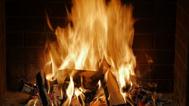 burning indoor fireplace, filmed in 4k