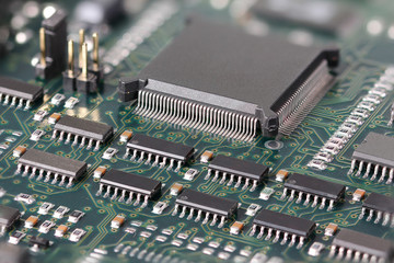 Green Circuit board with microprocessor and other electronic components