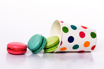 colorful macaroons are inverted in a circle