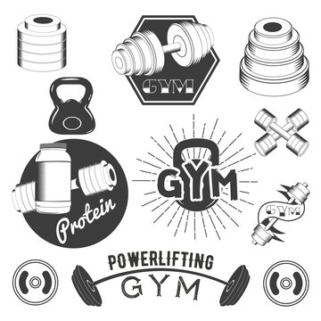 Set of gym labels in retro style. Sport fitness emblems, badges and logos for design. Vector illustration