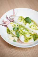 Steam squid with seafood dressing.