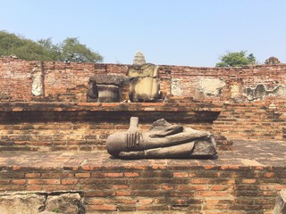 broken budha at old temple
