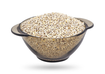 Pearl barley in bowl, isolated on white background