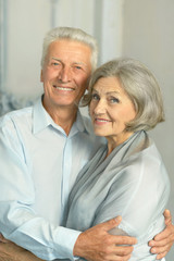 elderly couple in vintage interior