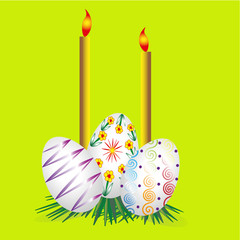 Three Easter eggs and two candles
Picture three Easter eggs and two candles on a green spring background eggs lie on dark green grass
