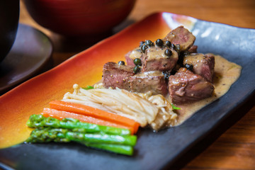 Beef steak with pepper sauce