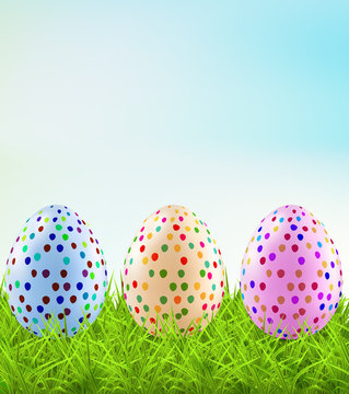 Festive Easter eggs on the grass
