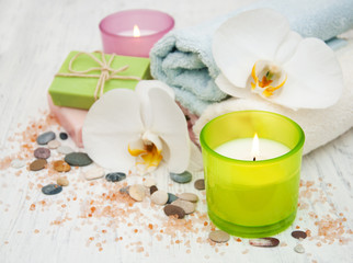 Orchids, candle, towel and handmade soap